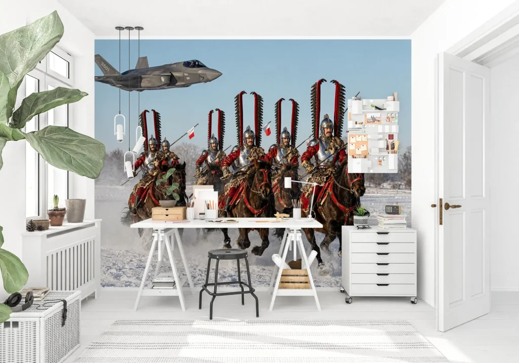 Husarze w srebrnych zbrojach galopujący po śniegu z biało-czerwonymi proporcami, nad nimi F-35 Husarz.